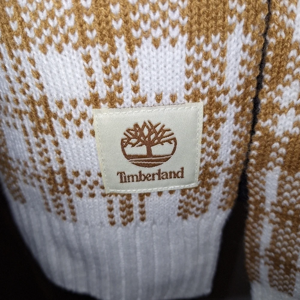 A Timberland white/ lt. brown plaid scarf that's 67